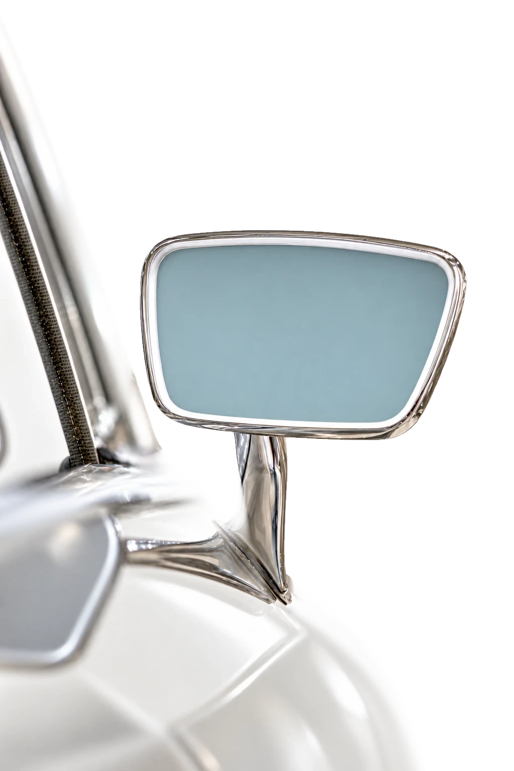 Close-up of the chrome wing mirror of a restored classic Mercedes-Benz