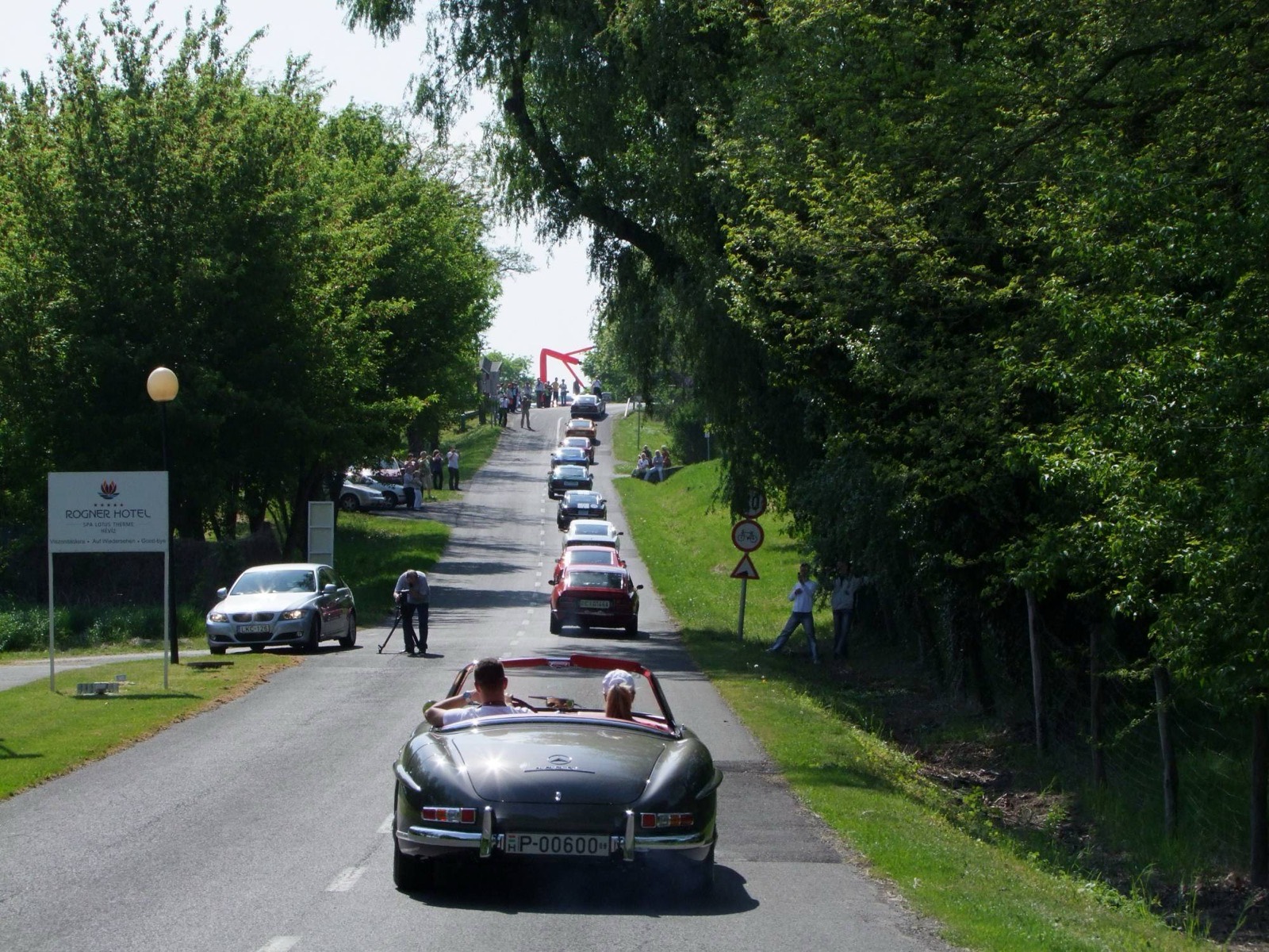 The 300 SL leading the parade of classic cars on the road in Hévíz
